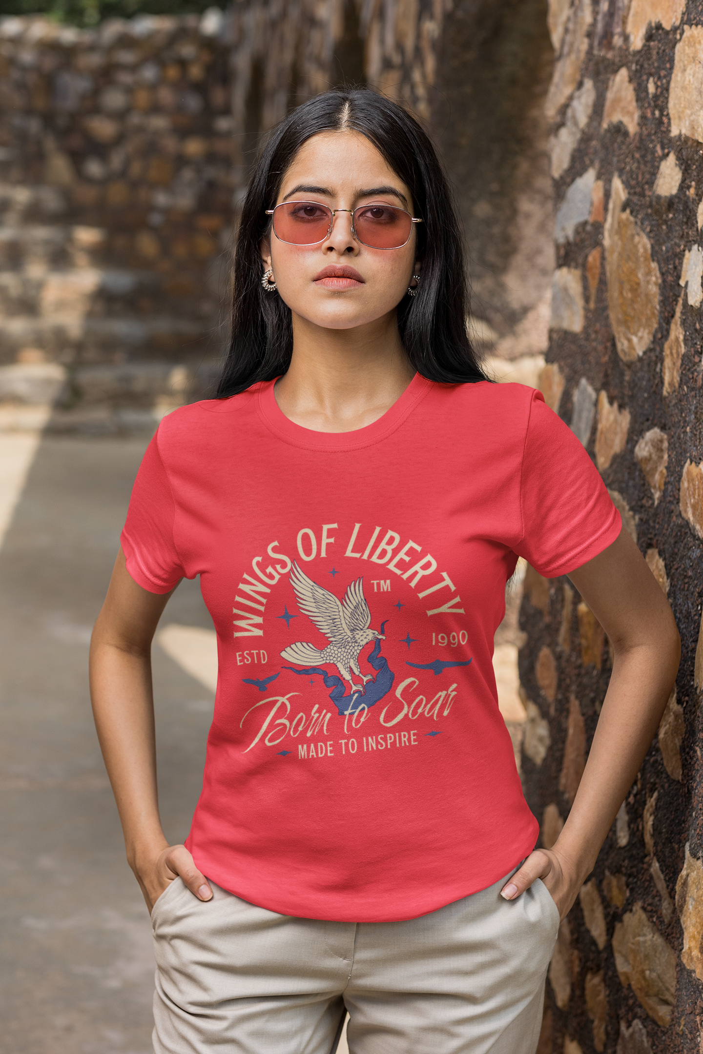 basic-t-shirt-mockup-featuring-a-serious-woman-with-sunglasses-with-her-hands-in-her-pockets-m26378.png